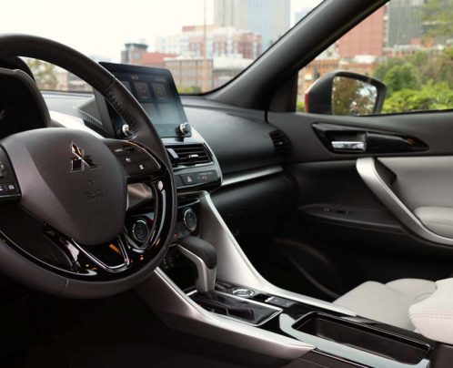2022-2023-mitsubishi-eclipse-cross-driver-side-light-gray-black-interior 2022-2023-mitsubishi-eclipse-cross-driver-side-light-gray-black-interior